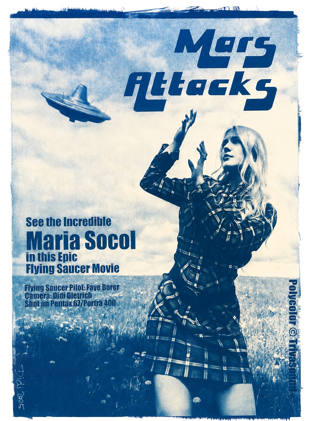 Cyanotype sun print of the Mars Attacks poster in prussian blue